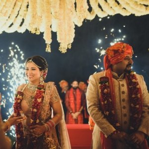 hindu south asian indian wedding with fireworks mandap