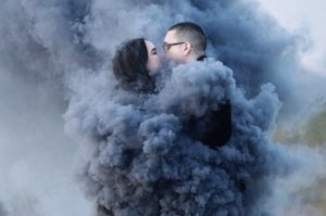 Smoke bomb wedding engagement photos in the desert